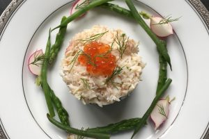 Brown crab with Russian salad